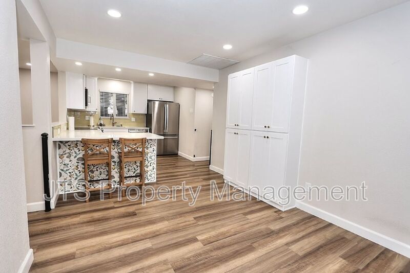 Updated gated home across from Del Paso Country Golf Club! property image