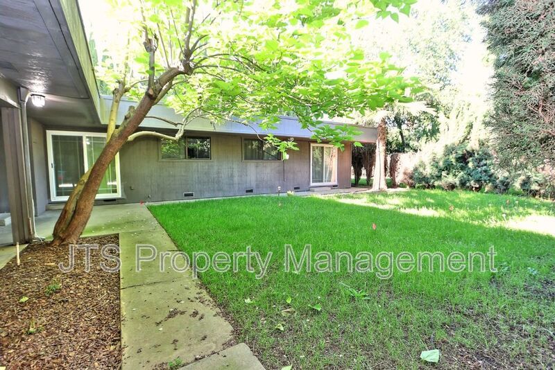 Updated gated home across from Del Paso Country Golf Club! property image
