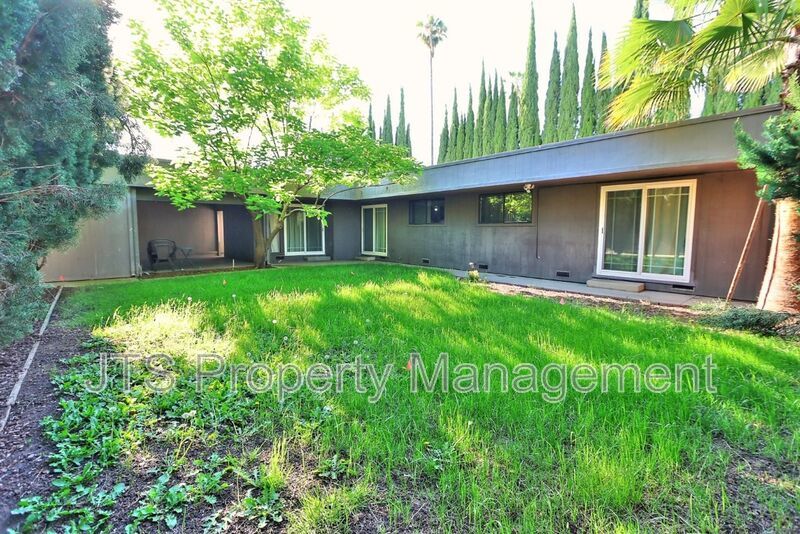 Updated gated home across from Del Paso Country Golf Club! property image