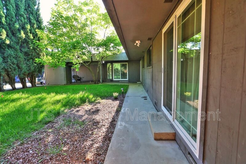 Updated gated home across from Del Paso Country Golf Club! property image