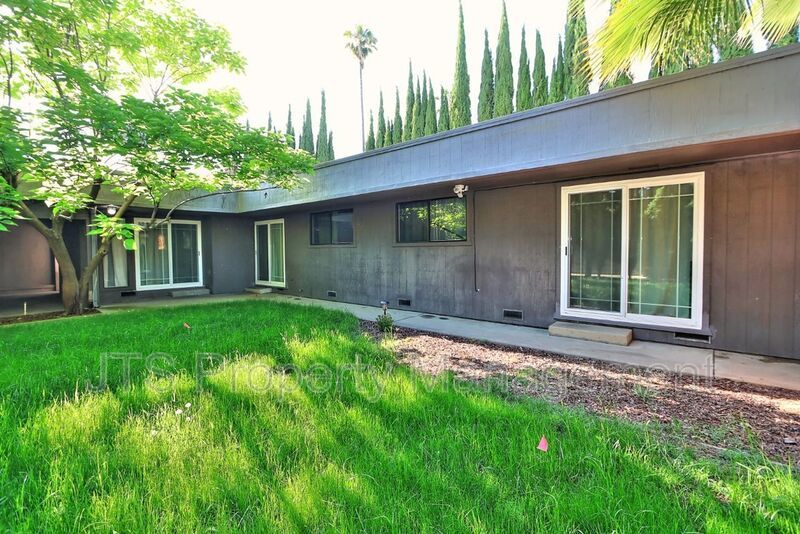 Updated gated home across from Del Paso Country Golf Club! property image