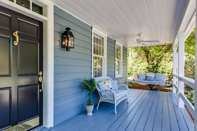 The front porch of a house with a blue and yellow color pallet.